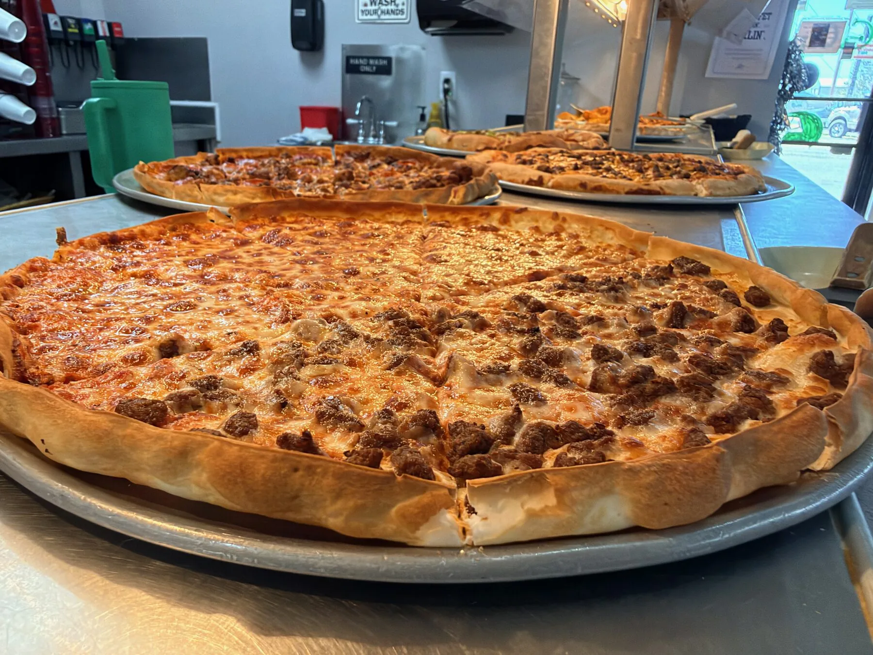 A fresh Ken's Pizza ready to serve